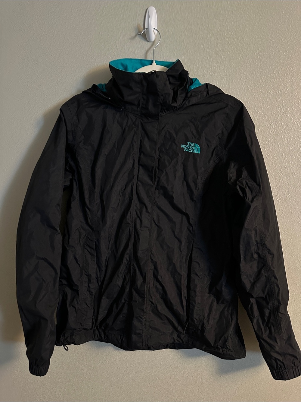 The North Face Men’s Black Rain Jacket with Teal Accent
